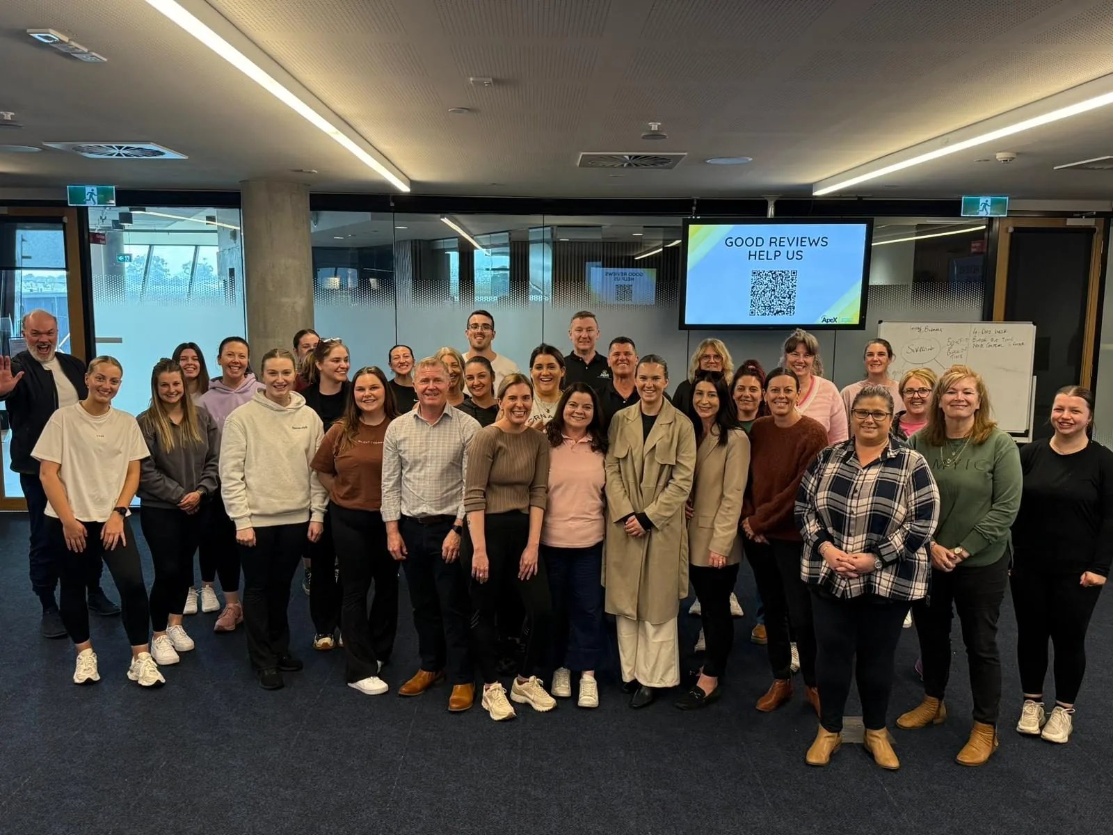 Group portrait of Apex training participants and trainers