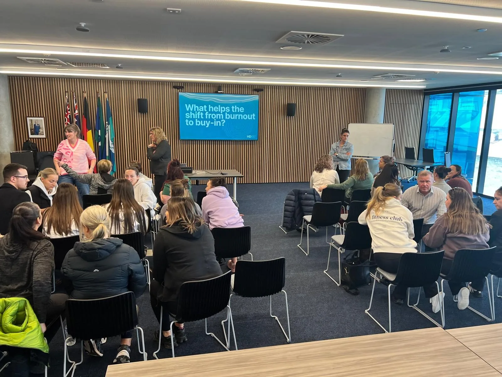 A supportive workplace wellbeing conversation between colleagues